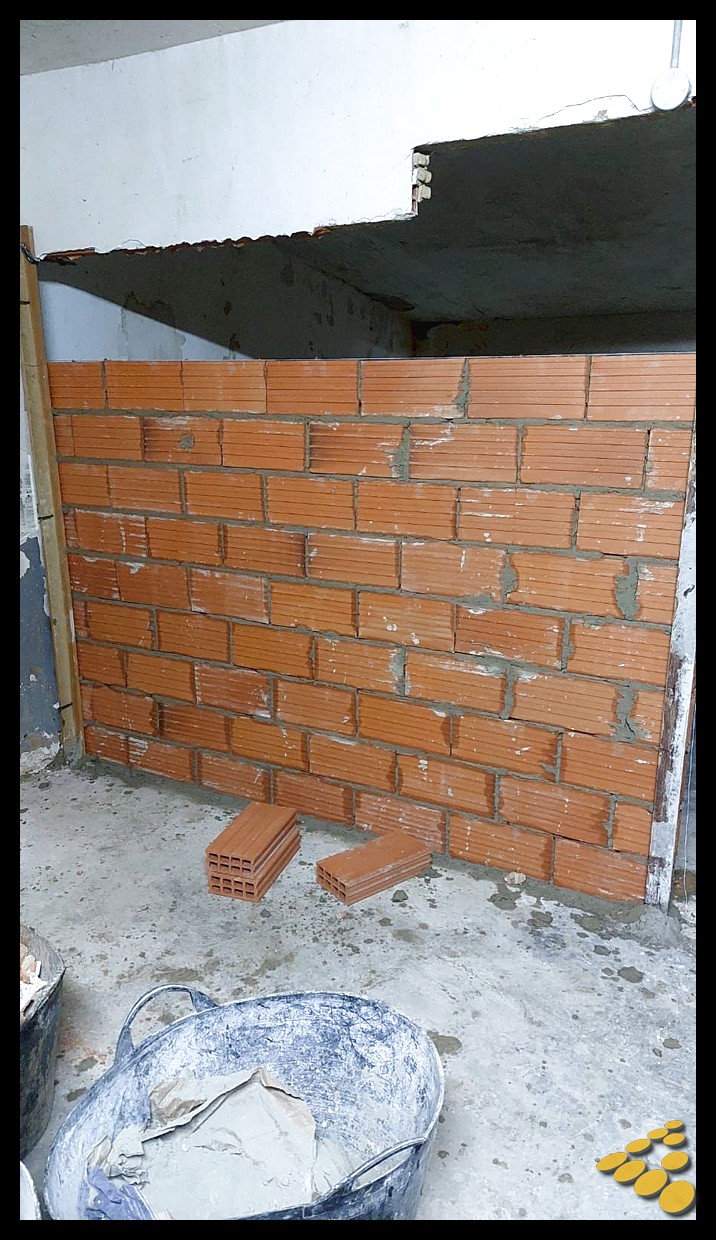 Colocación de puertas RF y de trastero nuevas en garaje comunitario afectado por inundaciones